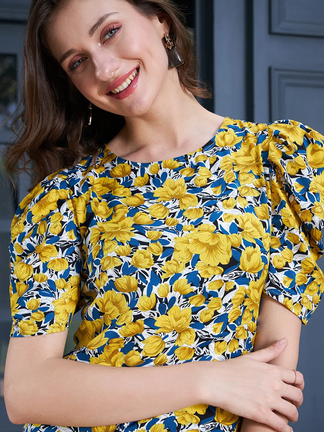 Berrylush Women Yellow & Blue Floral Printed Round Neck Puff Sleeves Crepe Button-Up Regular Top